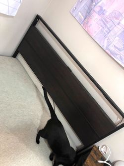 Dark brown/black bed frame