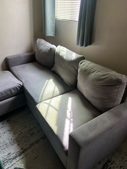 Grey L shaped couch. * PICK UP ONLY***
