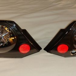 2000-2005 Mitsubishi Eclipse Euro Style Black Replacement Brake Tail lights Pair