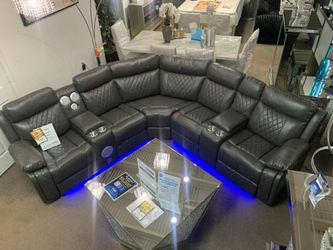 L.E.D. Power Reclining Leather Sectional w Bluetooth Speakers +