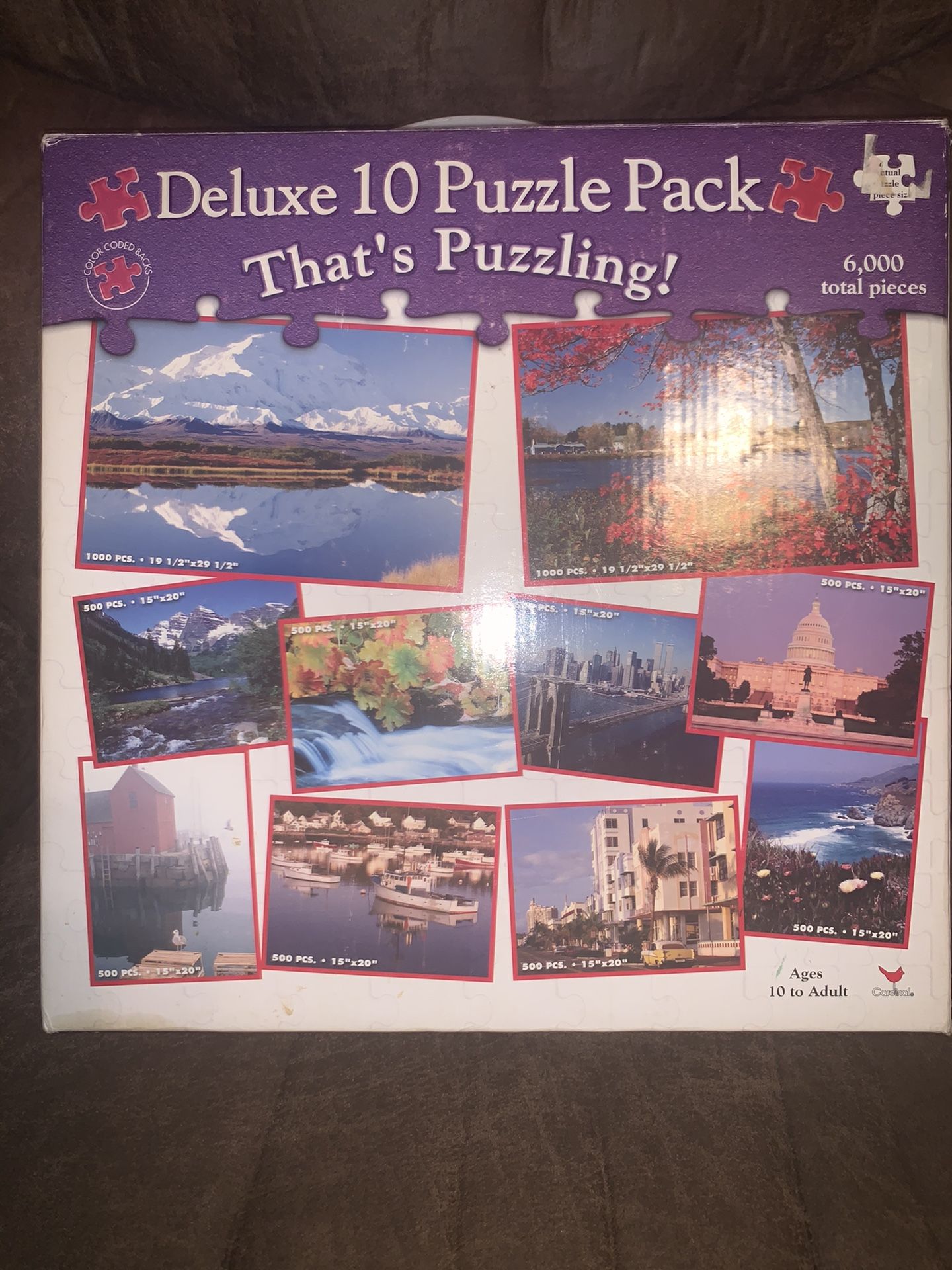 Vintage 10 puzzle set cardinal games that’s puzzling. 8- 500 piece puzzles 2 - 1000 piece puzzles.