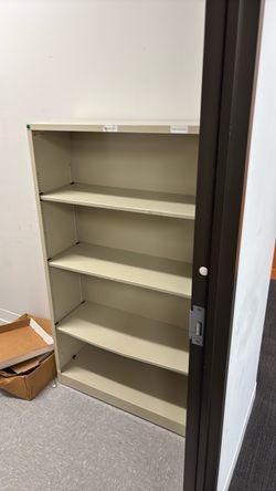Tan metal shelf 34.5 wide 59.5 tall 13 deep