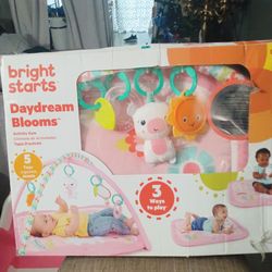Bright Stars baby Play Mat with toys.