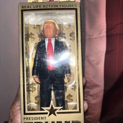 Trump action figure in box never opened 125