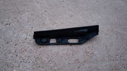 240SX S13 OEM driver side headlight backing plastic trim