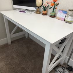Desk with attachable USB Device Charger. 