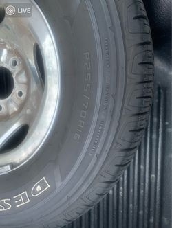 Four P225/70R16 Tires on four standard Ford Steel Wheels
