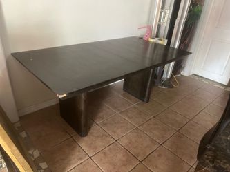 Dark wood dining table
