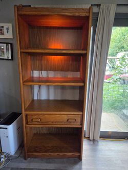 Lighted Oak bookshelf with drawer