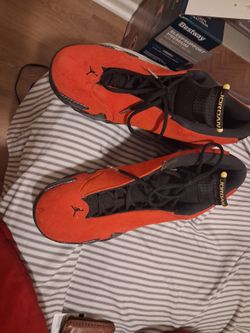 Red ferrari Jordan 14s