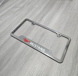 Brand New Universal 1PCS Mustang Metal Carbon Fiber Style License Plate Frame