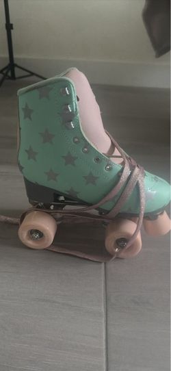 Teal Star Print Quad Roller Skates