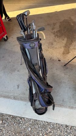 Golf clubs with Snake Eyes Bag