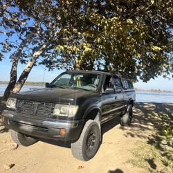 tacoma lifted/raised with camper shell