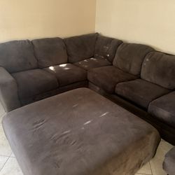 Very large sectional couch with ottoman