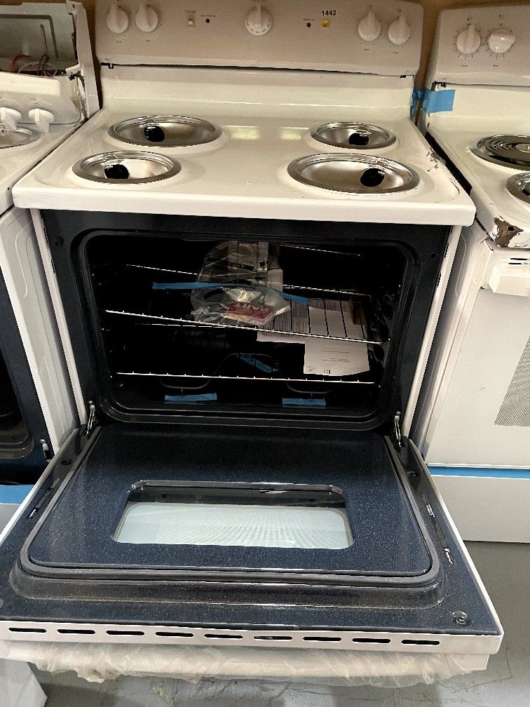 GE 30” electric stove with coils white DENTED 225 for Sale in Medley