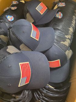 $10 each , Americana/navy flag trucker hats (100 available)