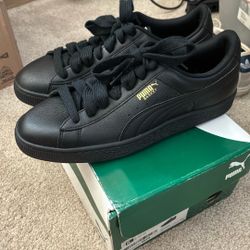 Black Leather Pumas Size 8.5
