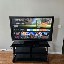 Tv (58") And Tv Stand
