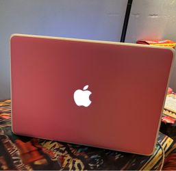 Apple MacBook with Pink Hard Shell Case