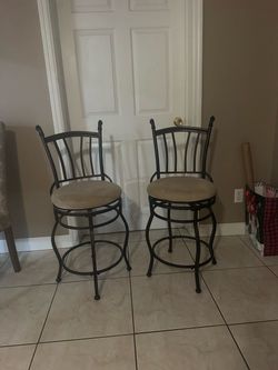 2 swivel chairs