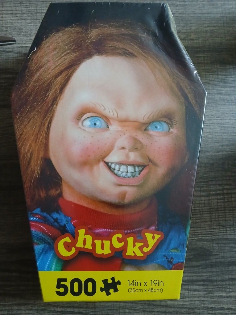 Chucky Coffin Box 500-Piece Jigsaw Puzzle, based on the Child's Play horror film franchise. 