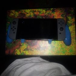 Nintendo Switch OLED With A lot Of Accessories Modded Nintendo switch OLED  2 MARIO JOY CON STEERING WHEELS, 2 NINTENDO PRO CONTROLLERS, 2 GAME ENHANC