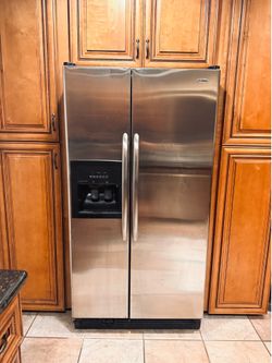 Amana refrigerator with water and ice maker. Works great.