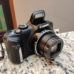 Canon PowerShot SX170 IS 16 Mega Pixel Digital Camera With Rechargeable Battery And Charger