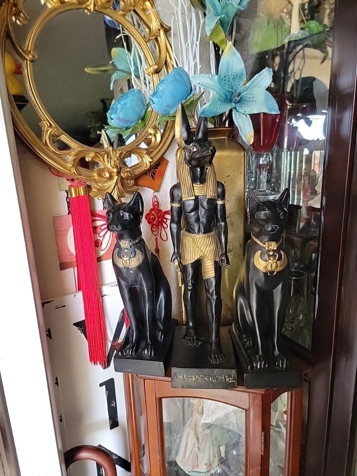Egyptian dog man with two cats