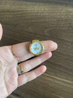 Golden watch ring with crown