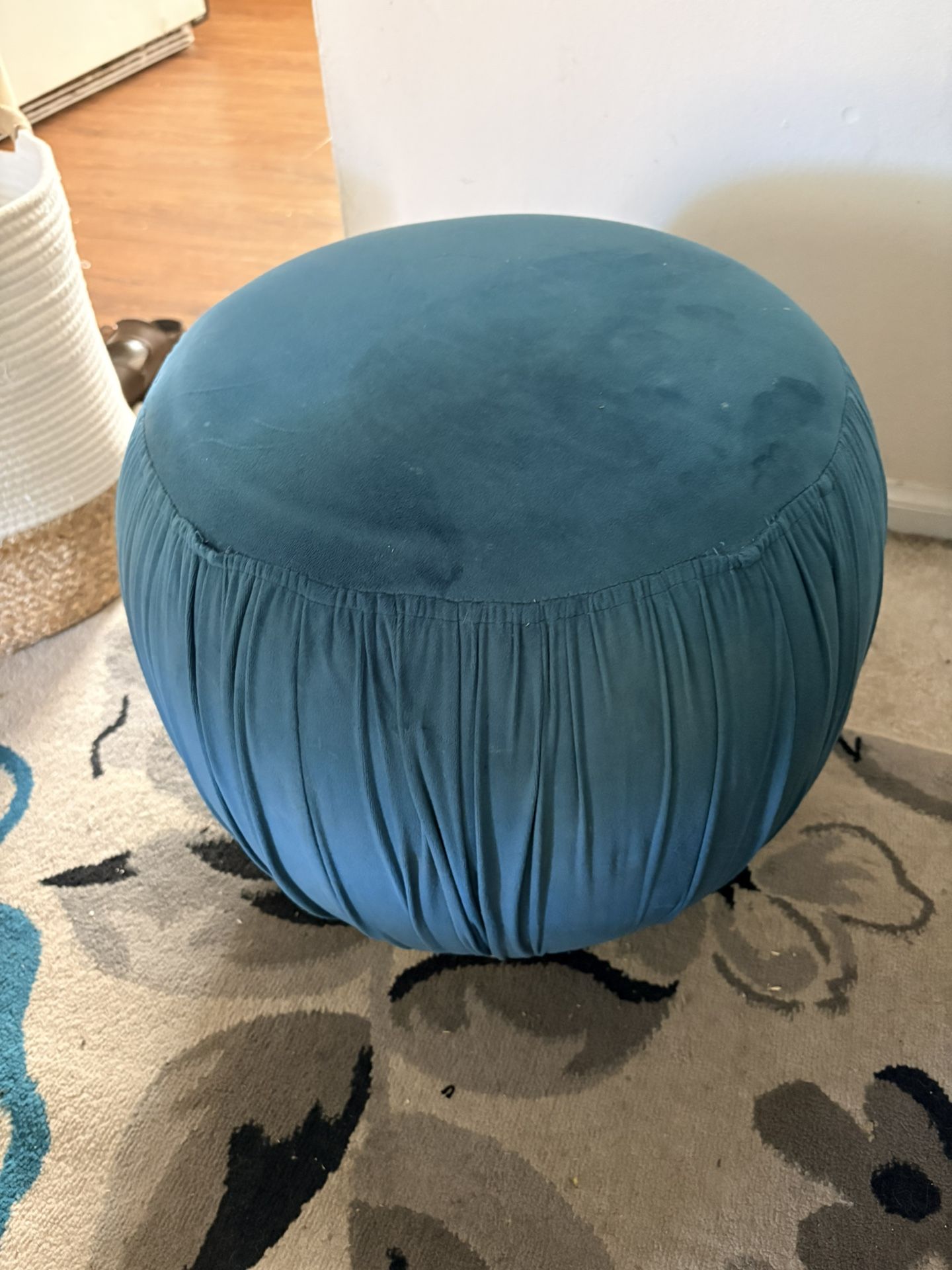 Teal velvet round ottoman with gold base