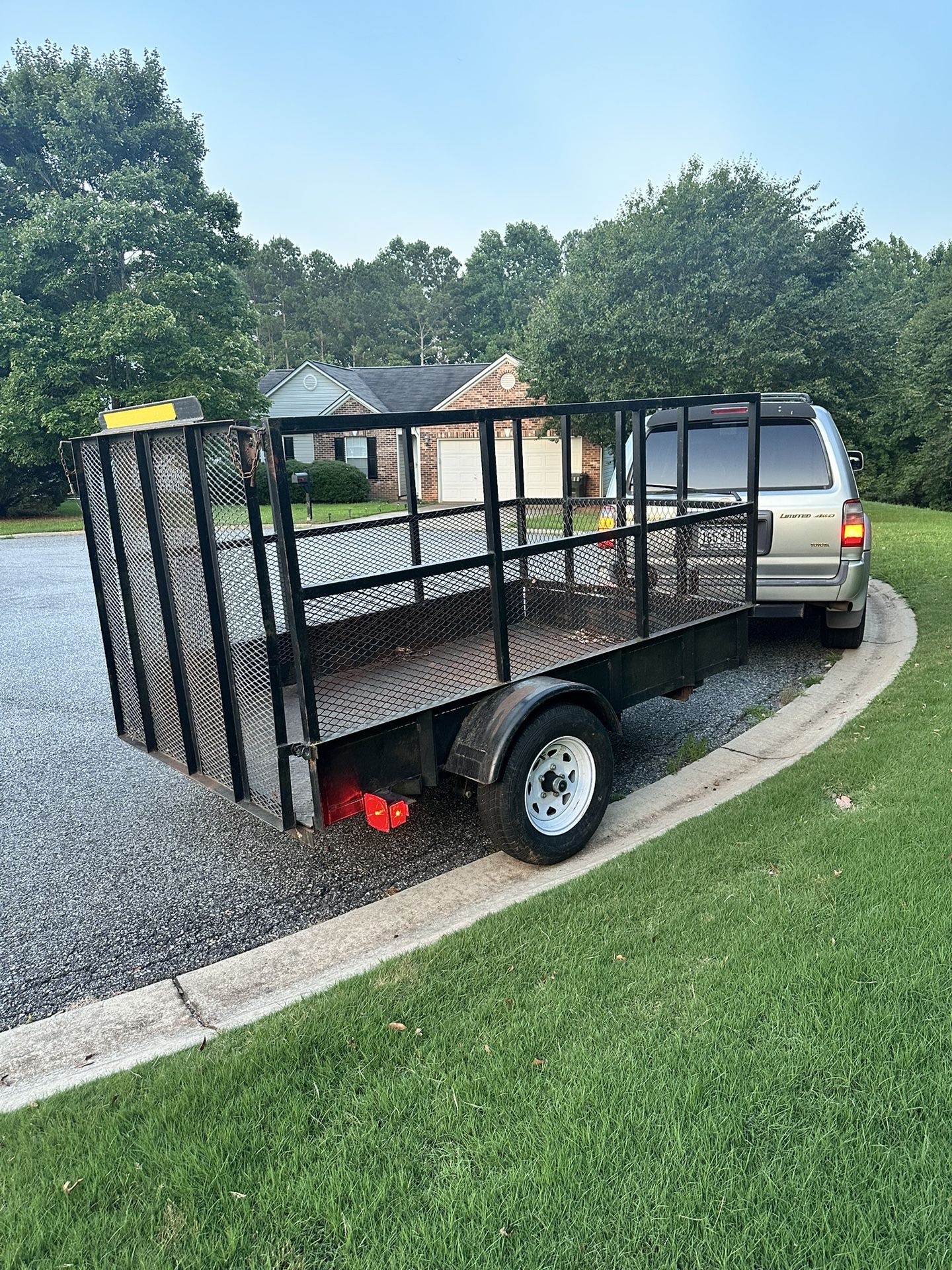 HEAVY DUTY 5X8 HIGH SIDES UTILITY TRAILER.
