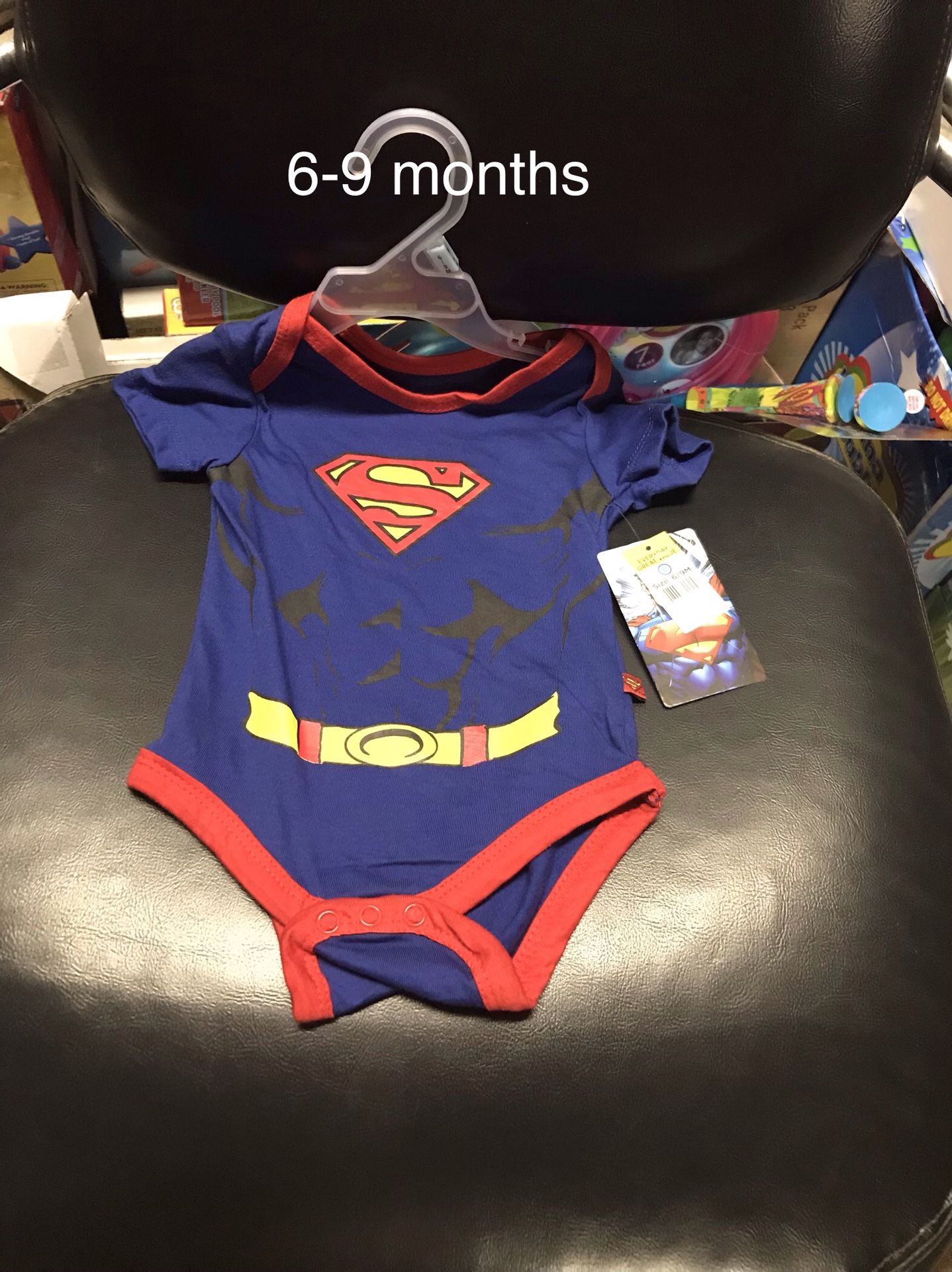 Brand new 6-9 months boys superman onesies