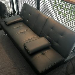 (2) Futon Couches (Converts to flat beds)