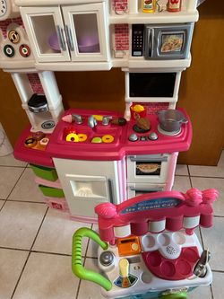 Play kitchen with play food