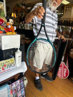 Wilson Hammer System tennis racket with a blue finish