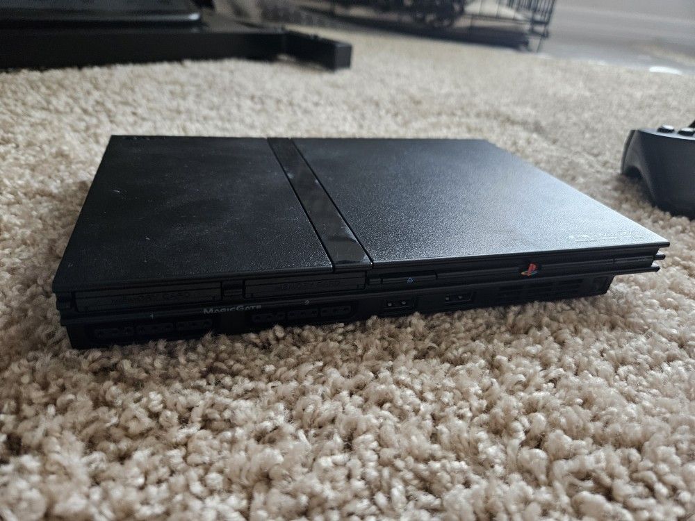 PS2 Slim ± Extra