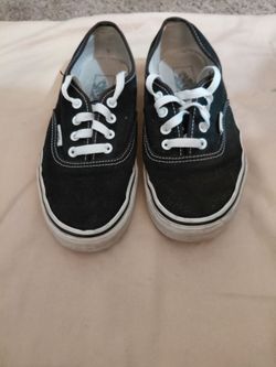 Black and white men Vans size 6