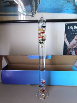 Vintage. New in box. Glass 24" Galileo thermometer.