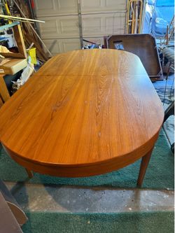 Mid-century modern MaKay teak wood dining room table