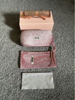 Miu Miu Light Pink Women’s Sunglasses