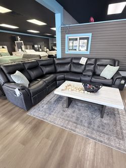 Ashley sectional recliner with led