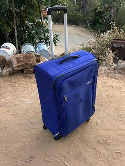 Check in size Samsonite suitcase.