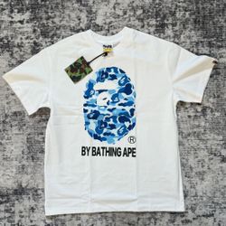 Bape head white on blue graphic tee shirt, BRAND NEW
