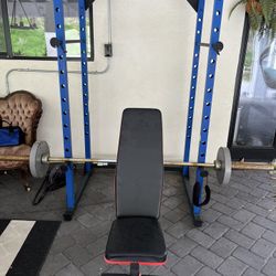 Weight Rack With Bench And Bar And Weights And Other Accessories 