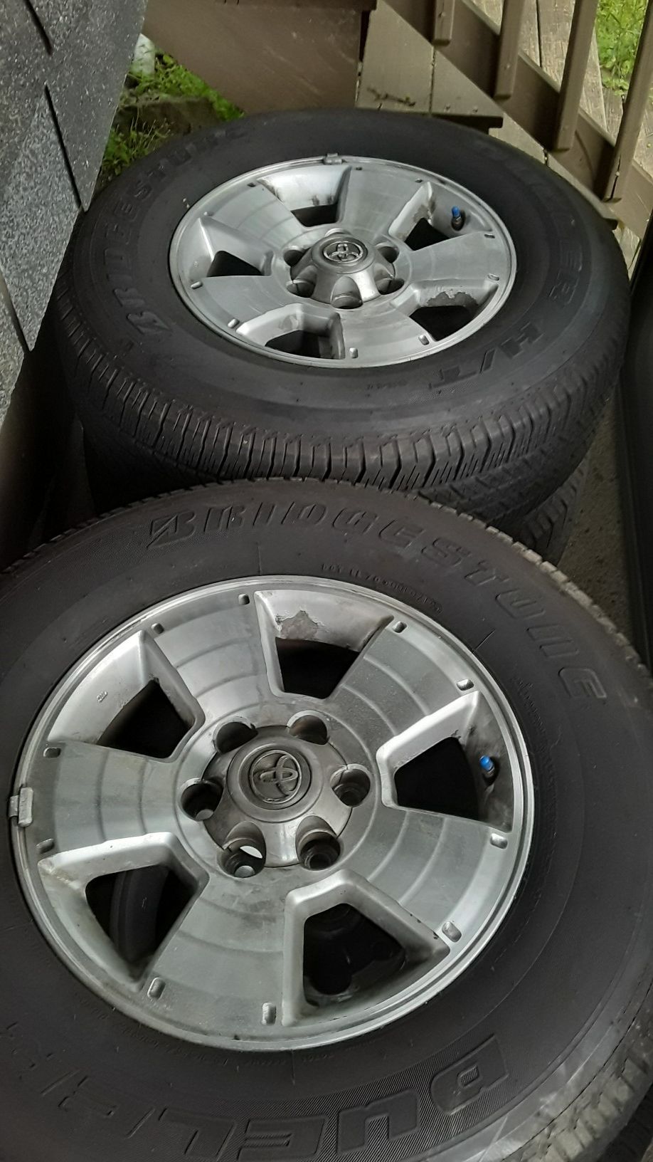 4. Like new Bridgestone 265/70/ R17 and alloy 6 bolt Toyota rims