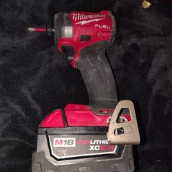 Milwaukee M18 FUEL 1/4" Hex Impact Driver with an M18 REDLITHIUM XC battery
