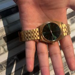 Gold Nixon Watch