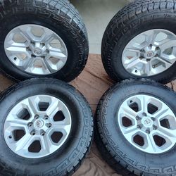 17" TOYOTA WHEELS  LT TIRES READ AD